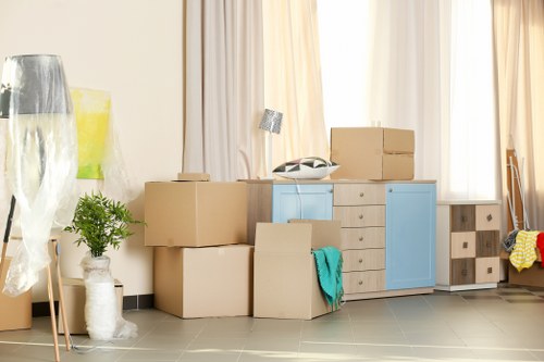 Removal van and moving boxes for a local Earls Court home move
