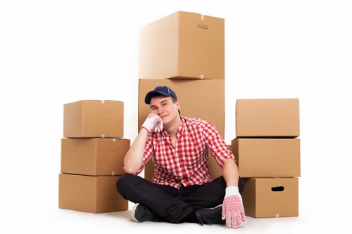 Office relocation items being loaded into a removal van